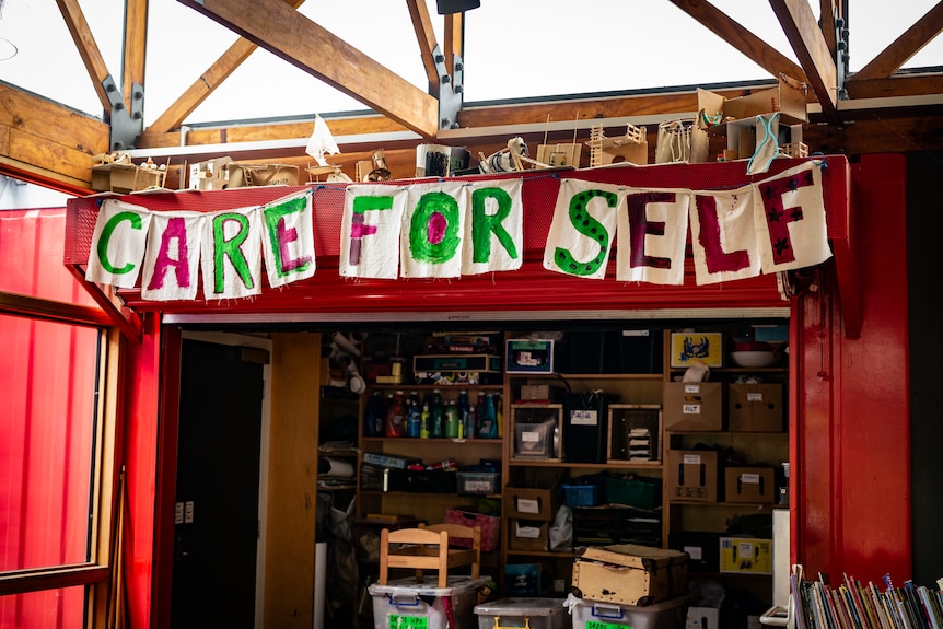 A large banner is seen that says 'care for self'
