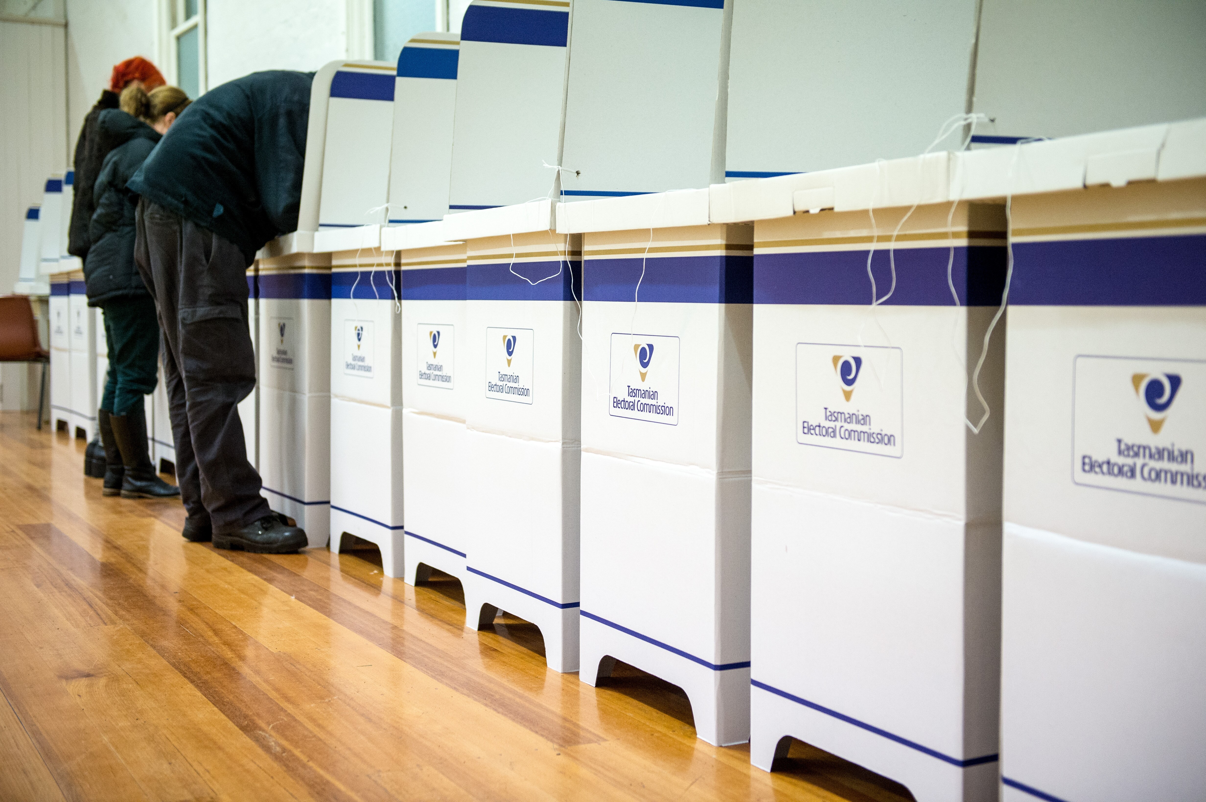 a row of voting ballot boxes