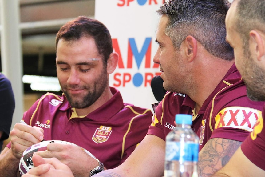 Cameron Smith, Corey Parker and Nate Myles sign autographs