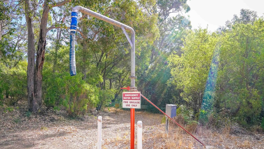 An emergency water supply pipe set up in bushland
