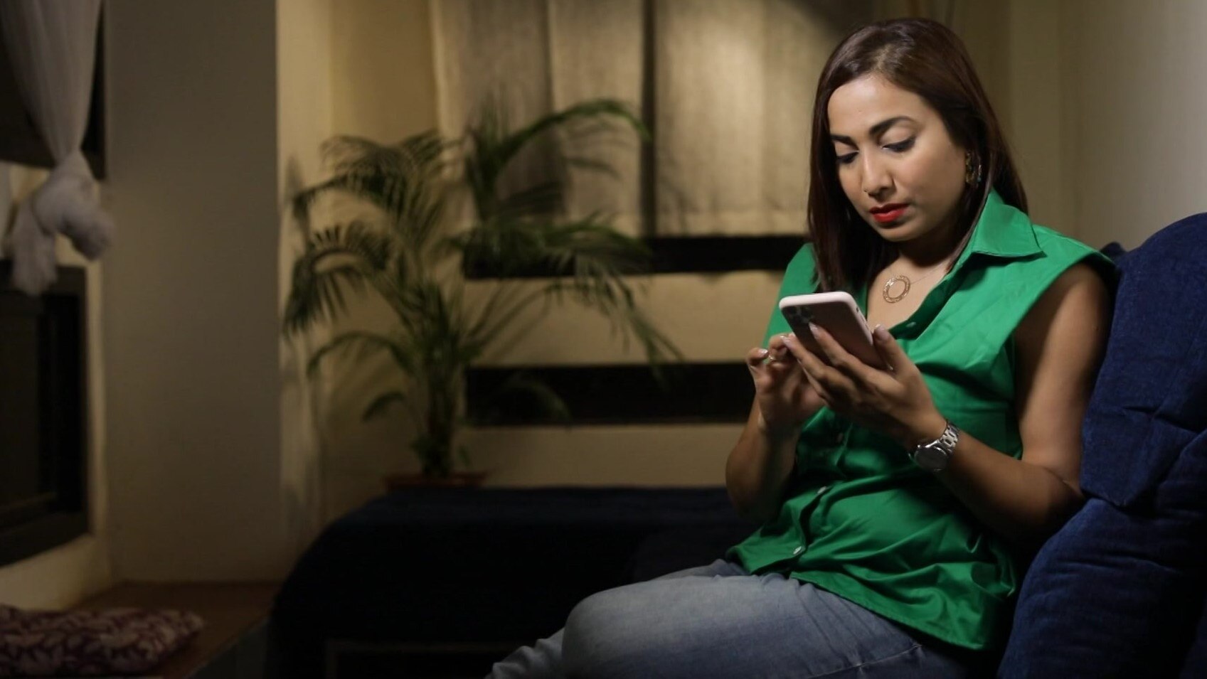 Rohini Ramnathan on her phone