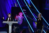 Laurie Anderson (L) accepts the Rock and Roll Hall of Fame induction on behalf of Lou Reed