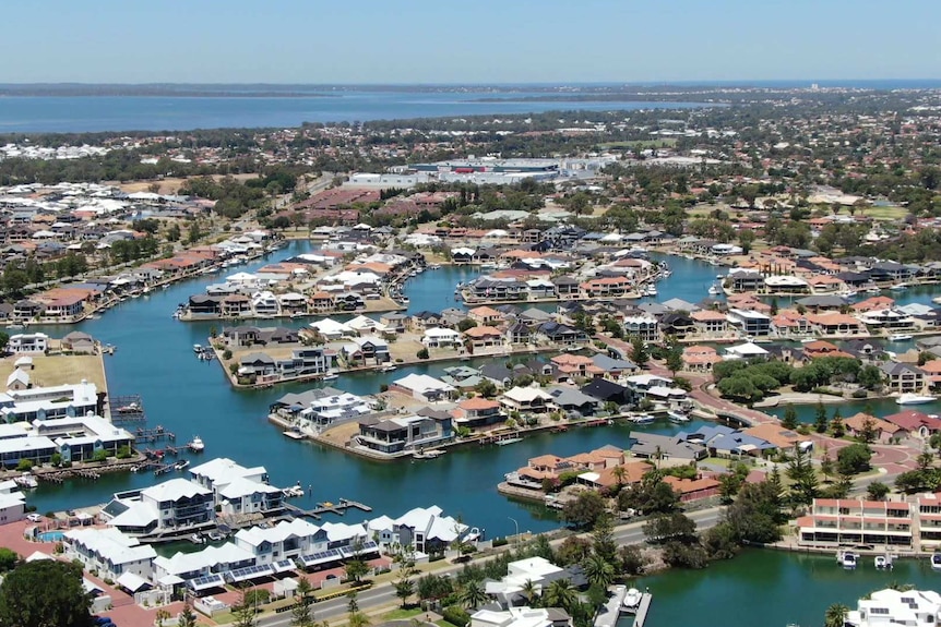 An aerial drone shot of Mandurah looking south toward the Dawesville Cut.