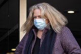 Former Glamorgan Spring Bay mayor Debbie Wisby leaving the Hobart Magistrates Court while wearing a face mask.