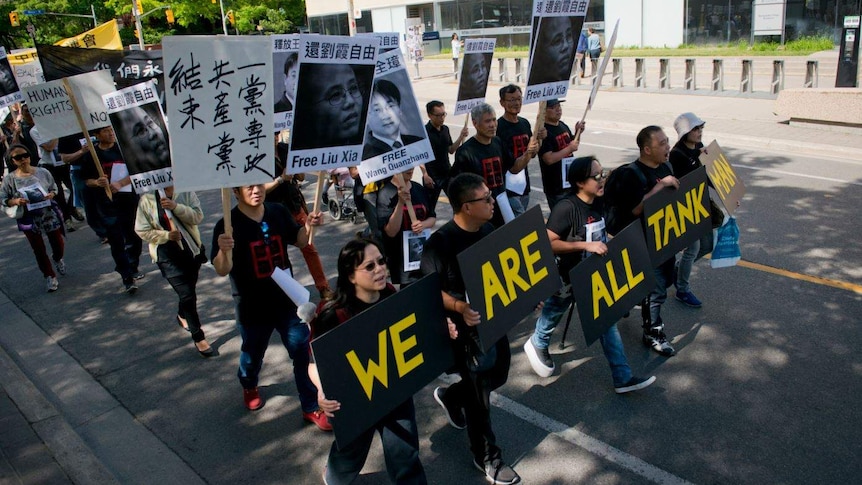 Overseas Chinese people were protesting in Toronto to Chinese Communist Party for releasing Liu Xia and Wang Quanzhang.