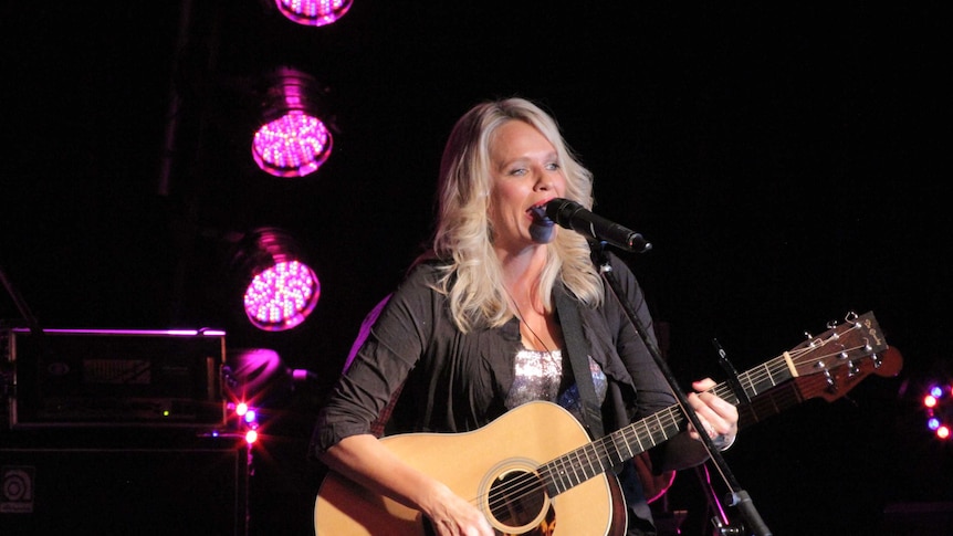 Beccy Cole on stage in Tamworth