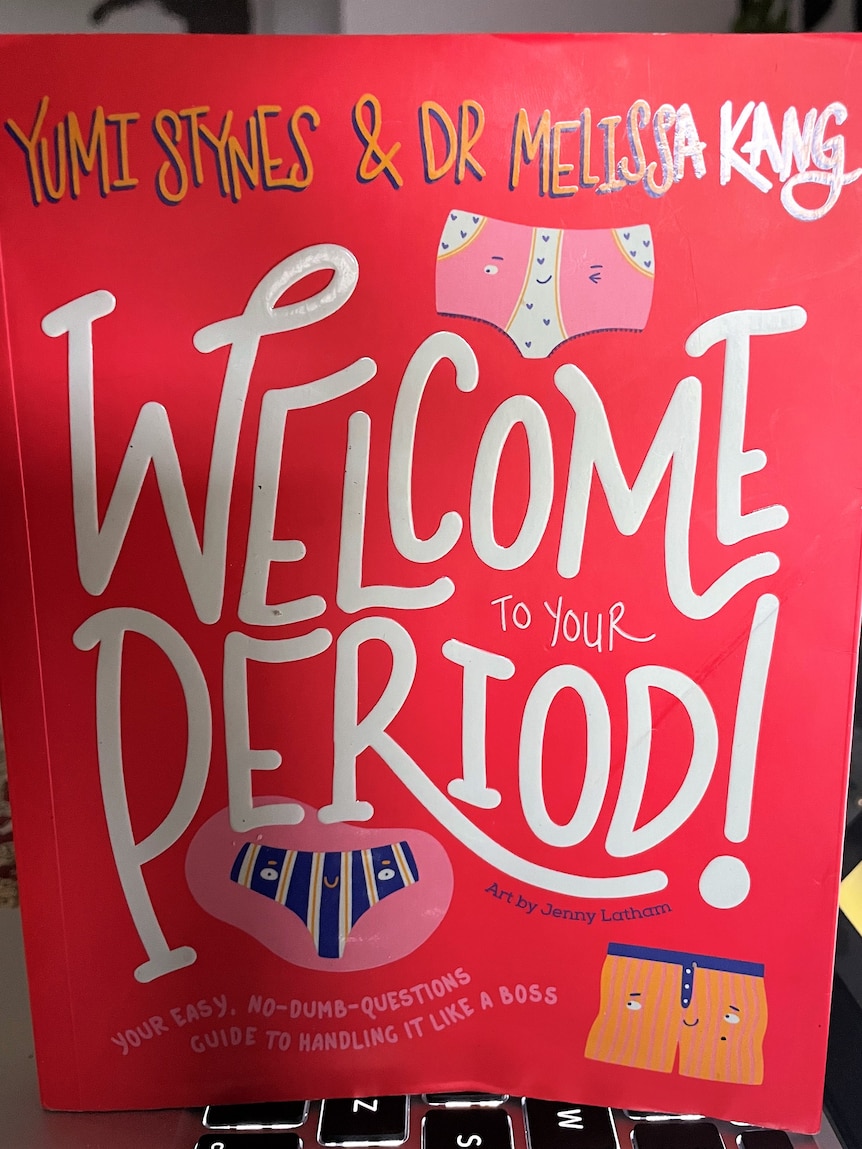 The front cover of a book entitled Welcome to Your Period which has a red background and white writing