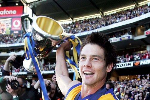 Ben Cousins celebrates with the premiership cup