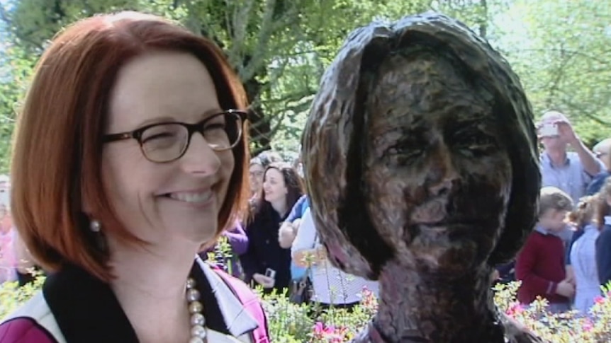 Julia Gillard with a sculpture of herself along Ballarat's Prime Ministers' Avenue on 9 October, 2014.