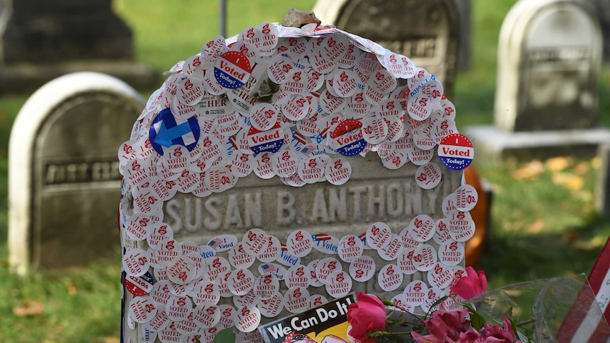The grave of women's suffrage leader Susan B Anthony is covered with "I Voted" stickers left by voters in the US presidential election, at Mount Hope Cemetery in Rochester, New York November 8, 2016.