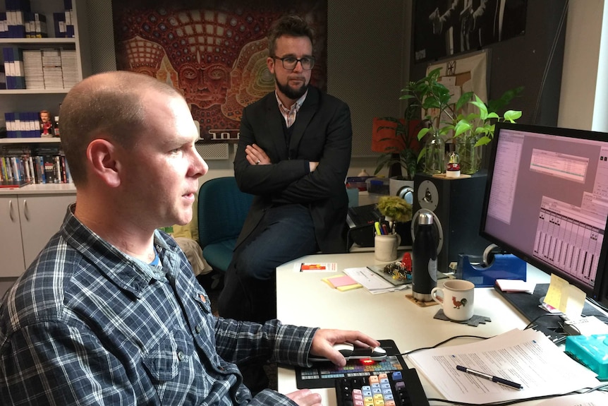 Producer Justin Stevens and editor Guy Bowden in the Four Corners edit suite.