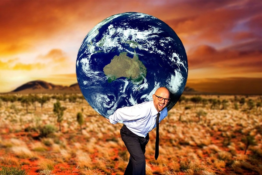 A stylised image of a man standing in a desert setting while holding a globe of the world on his back.