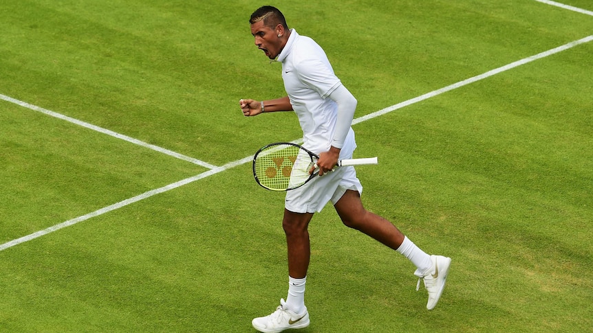 Nick Kyrgios celebrates after beating Juan Monaco at Wimbledon