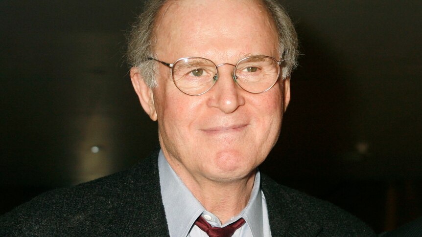 Charles Grodin smiles to the camera