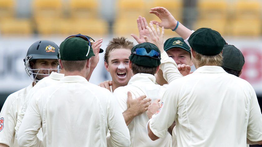 Nathan Hauritz finished with five wickets and his maiden Test half-century in a dominant Australian performance.