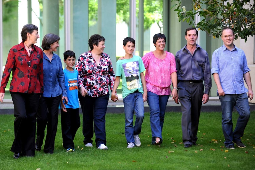 A group of people walking.