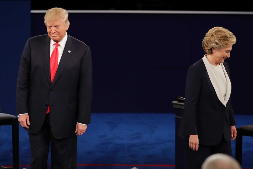 Trump and Clinton face different directions during second presidential debate in St Louis