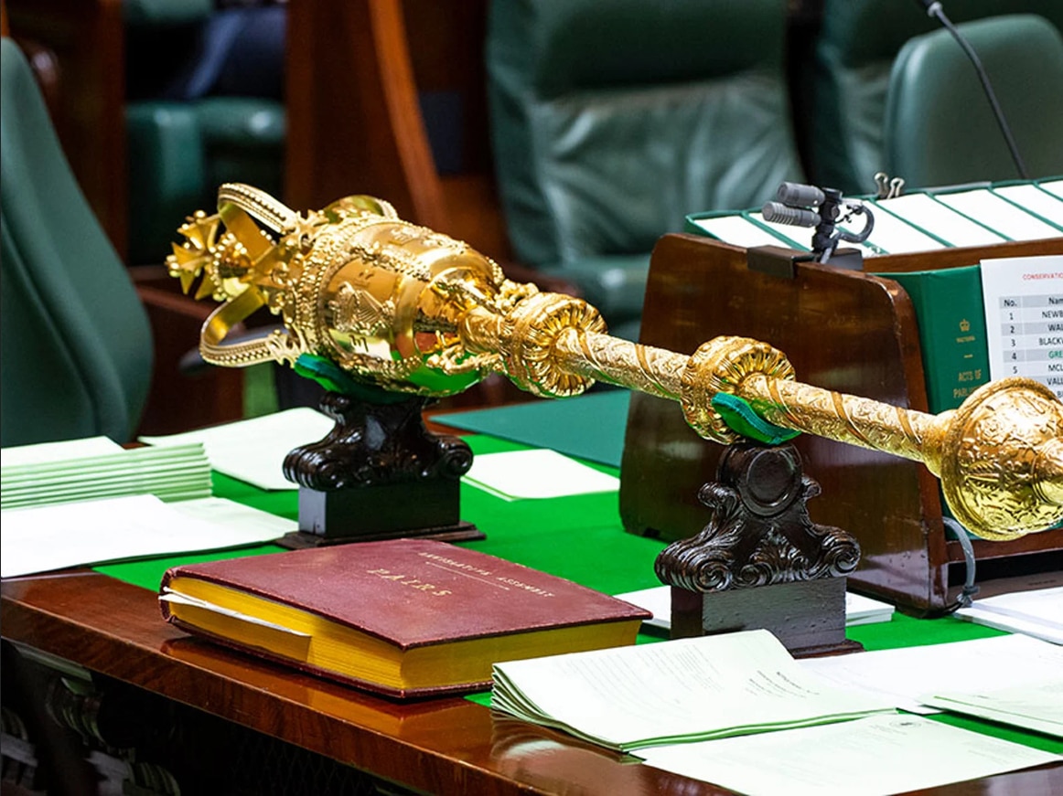 A close up image of the golden ceremonial mace, in Victoria's parliament.