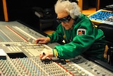 British DJ Ruth Flowers, 69 year-old, mixes music at a recording studio