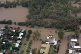 An aerial view of flood water surging in the town of Theodore