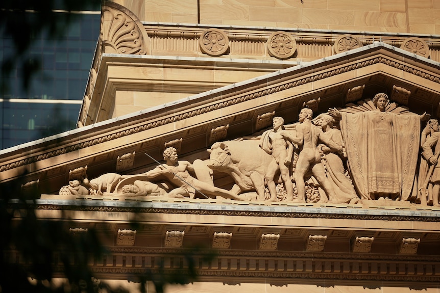 sculptures on Brisbane City Hall's exterior
