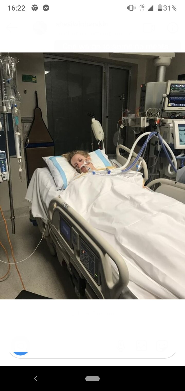 Chloe laying in a medical bed due to her drug addiction.