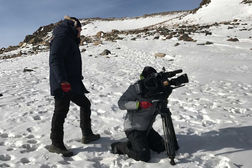 Matthew Carney and Ziyuan Wang filming in the freezing conditions.