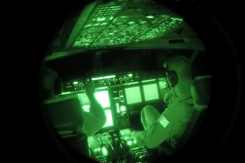 Night Vision image of Royal Australian Air Force Air Task Group KC-30A Multi Role Tanker Transport crew at work,