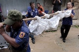 Body taken away from Thailand mass grave site of trafficked workers