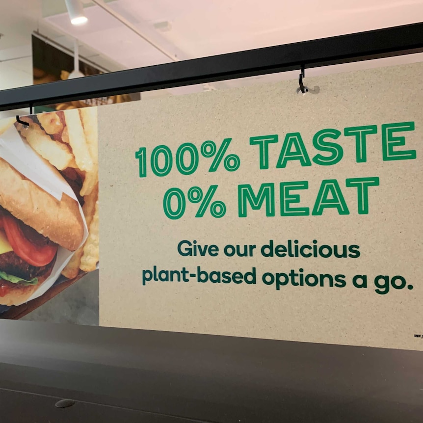 Sign in a supermarket promoting plant-based meats