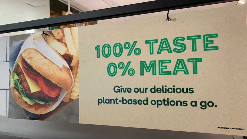 Sign in a supermarket promoting plant-based meats