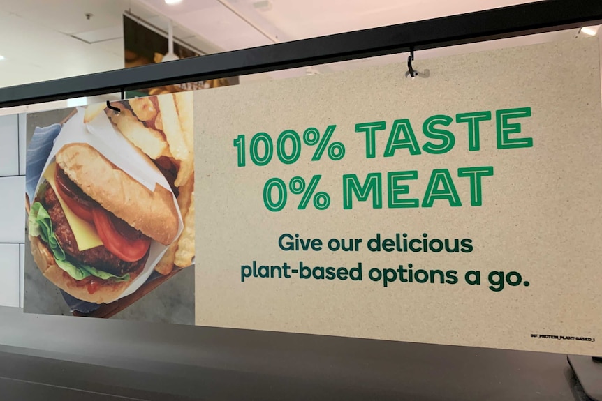 Sign in a supermarket promoting plant-based meats