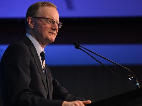 RBA governor Philip Lowe speaking at a lecturn