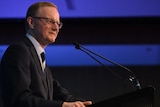 RBA governor Philip Lowe speaking at a lectern