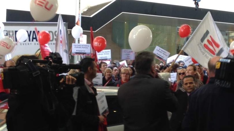 NSW Catholic school teachers protest against proposed changes to work conditions in Sydney's CBD.