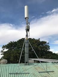 A satellite small cells on the roof of a home.