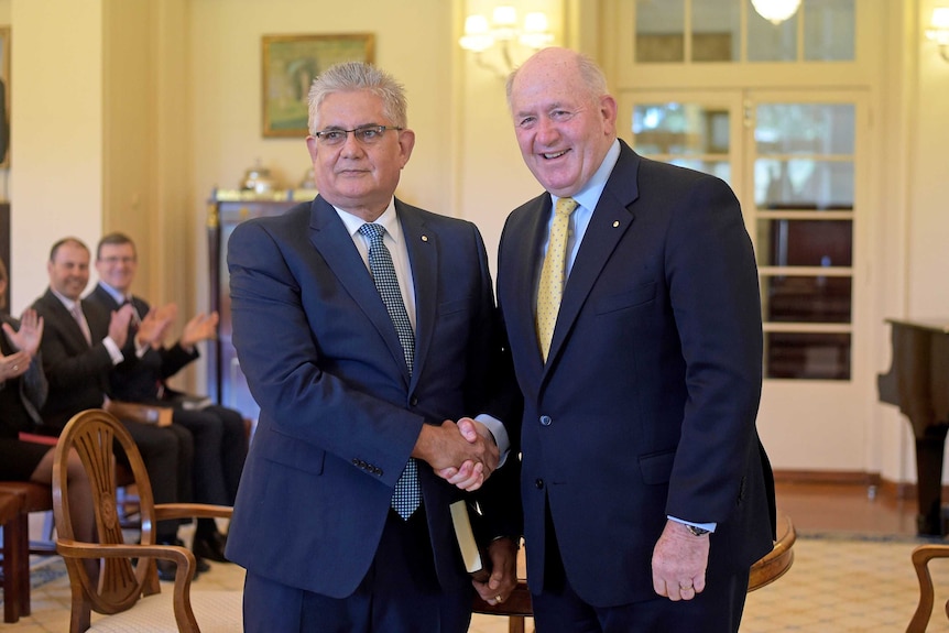 Australian Governor-General Sir Peter Cosgrove (right) with Assistant Health Minister Ken Wyatt