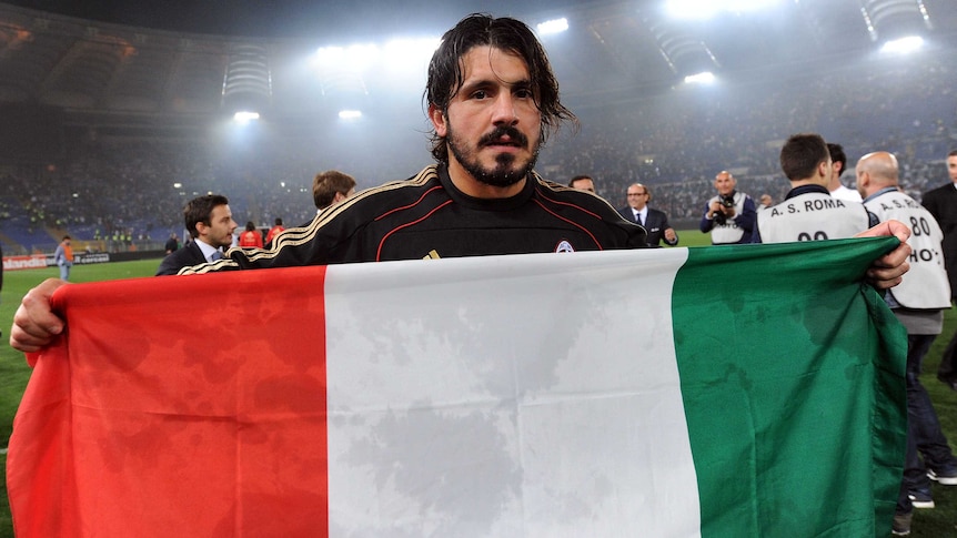 AC Milan's Gennaro Gattuso celebrates a victory over AS Roma on May 7, 2011.