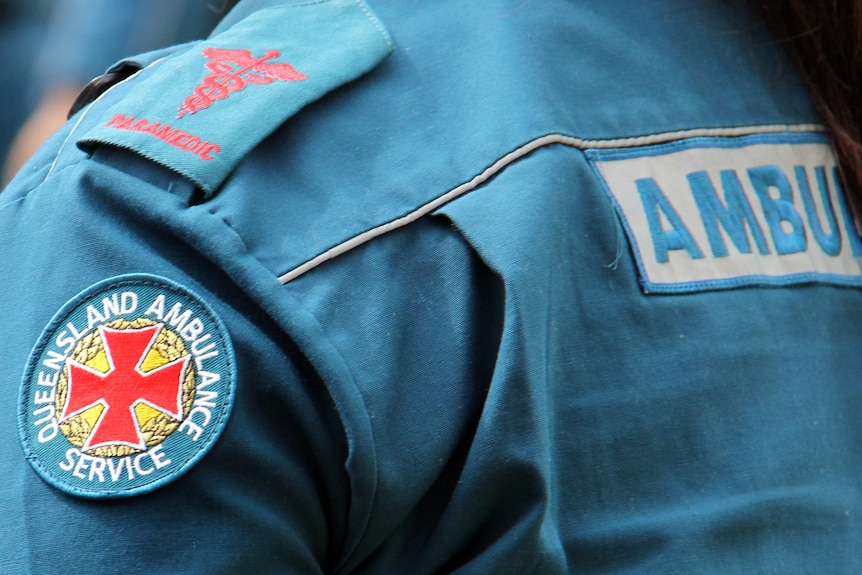 Queensland Ambulance Service officer on a job.