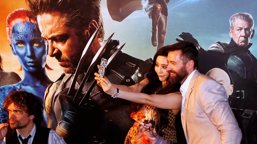 Fan Bingbing with Hugh Jackman at the launch of XMen: Days of Future Past in Singapore.