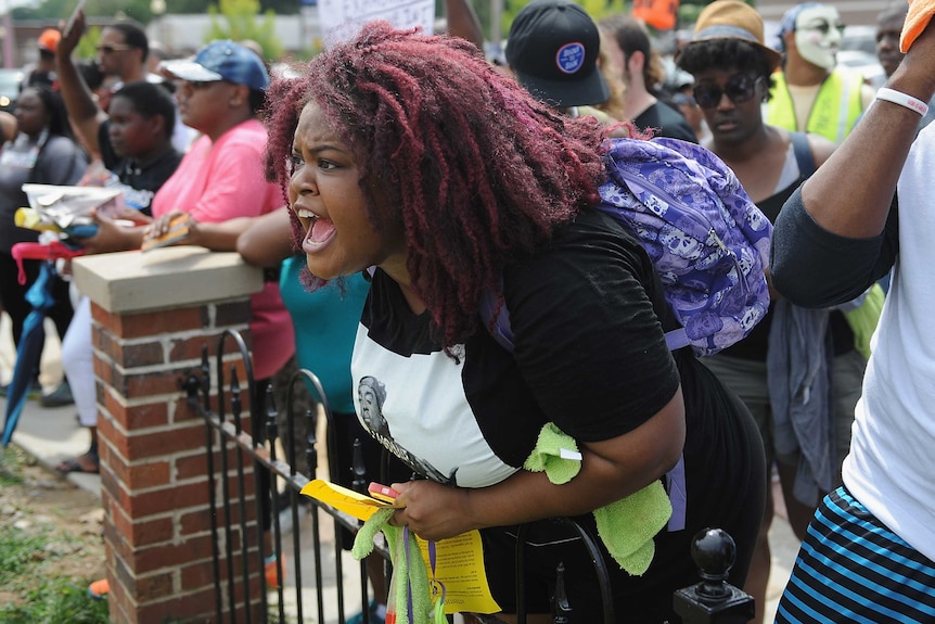 Demonstrators protest outside Ferguson