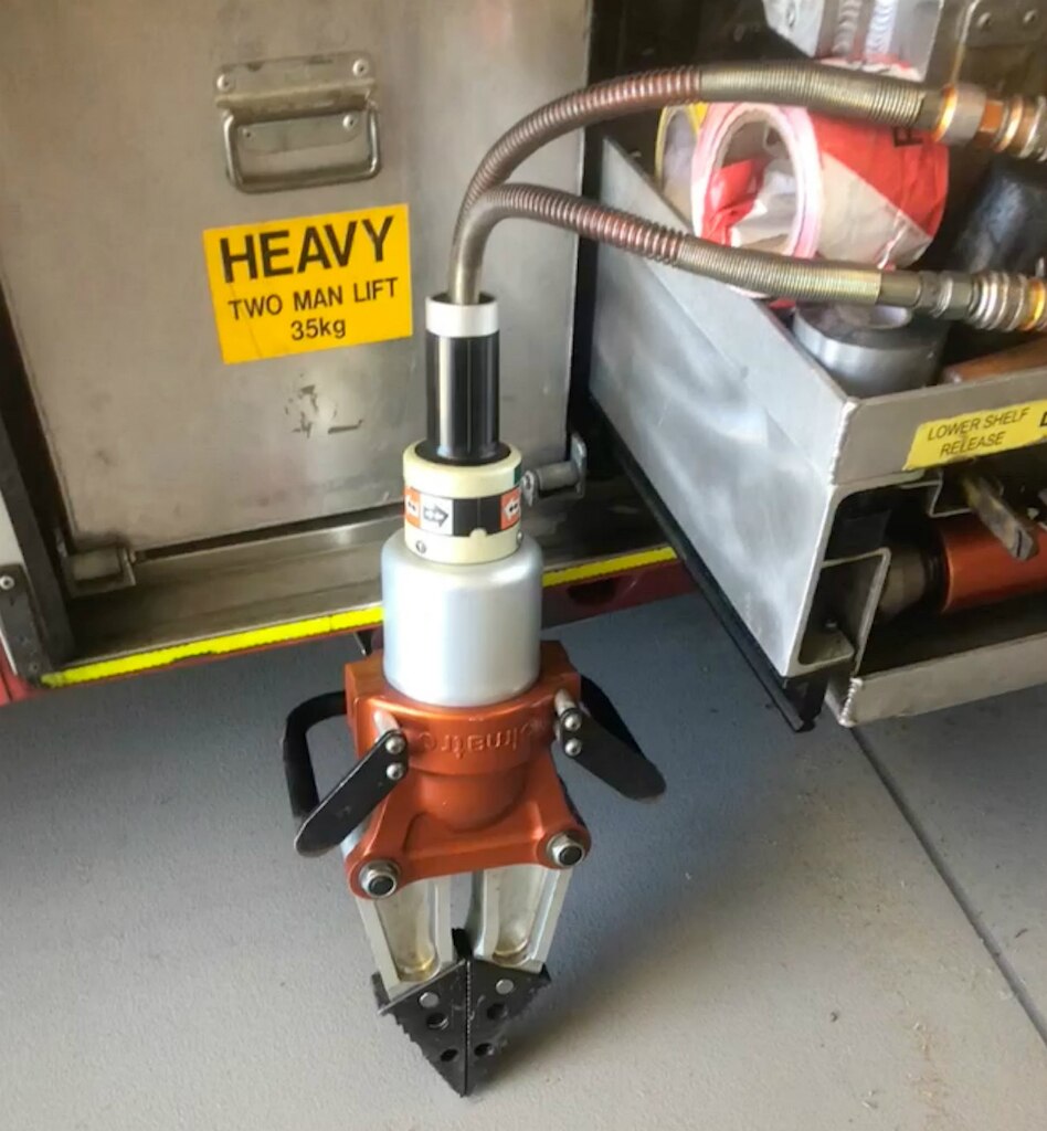 Firies use jaws of life to rescue puppy trapped under grandmother's