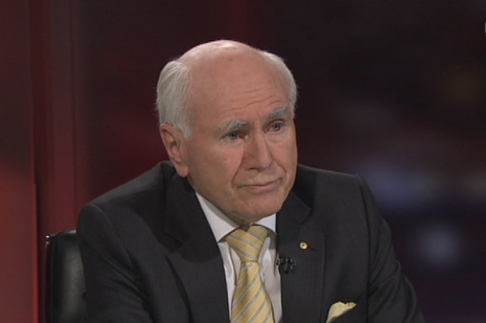 Former prime minister John Howard is interviewed on the Lateline set.
