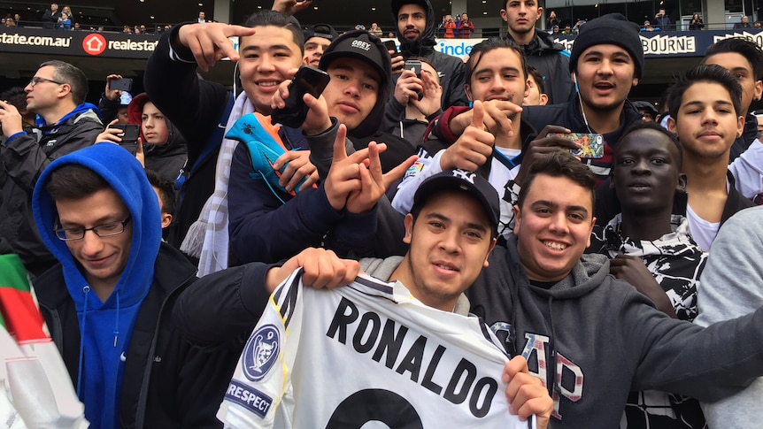 Fans of Real Madrid watch the players train for their International Champions Cup match at the MCG.