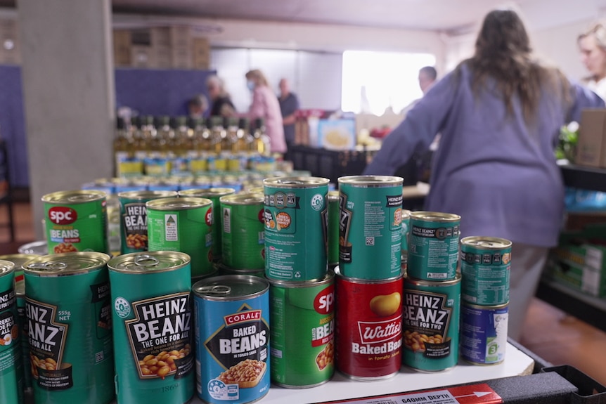 Cans of baked beans at the Ipswich Assist Restore charity grocery store