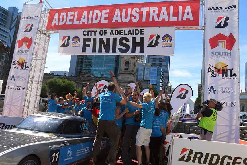 The Bochum solar team from Germany in the cruiser class crosses the finish line in Adelaide.