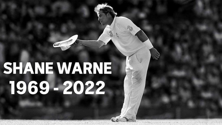 Shane Warne bowing to the crowd.