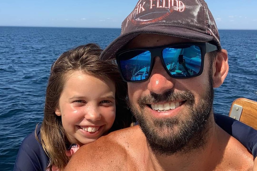 Glenn Anderson and his daughter Ruby on Mr Anderson's yacht.