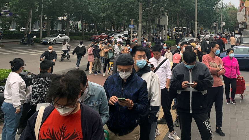 residents-queue-at-supermarkets-for-essentials-as-beijing-denies-it-s-heading-for-lockdown