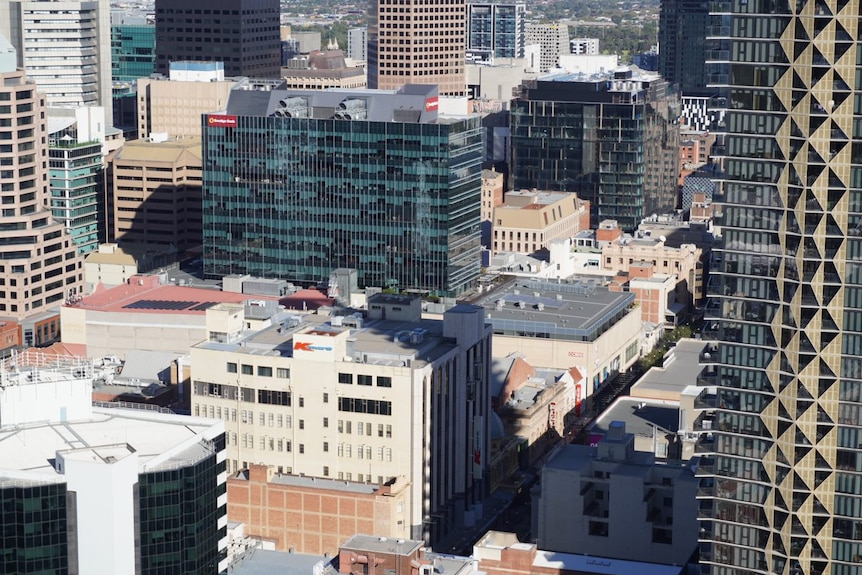 A frame filled with city buildings in Adelaide, looking down on Rundle Mall.